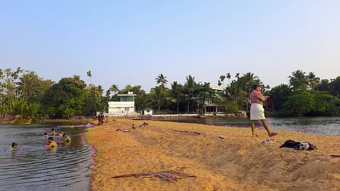 A sand bund separating the Periyar and Chalakudy rivers